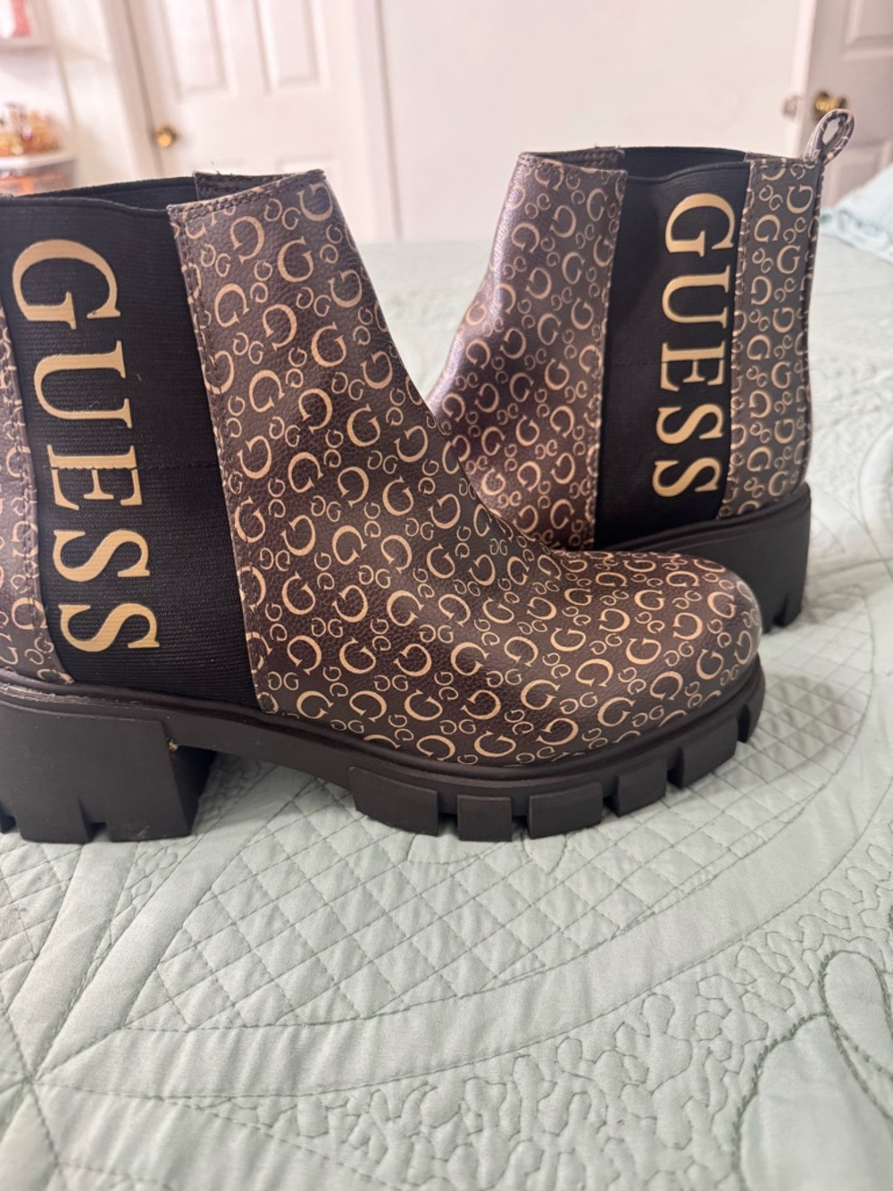 GUESS Brown Logo Chelsea Lug Booties with Gold Branding